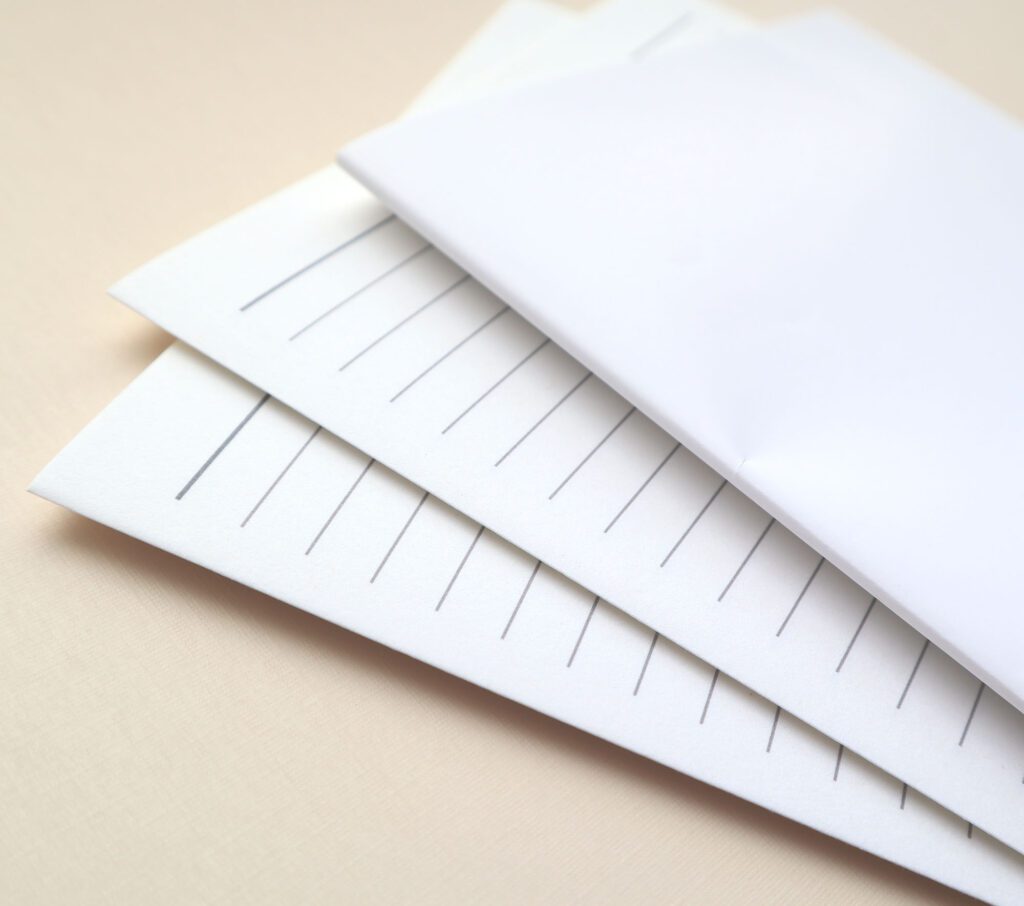 stack of individual folded sheets of paper called folios