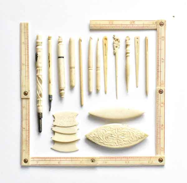 set of ancient older bone folders made of ivory illegal