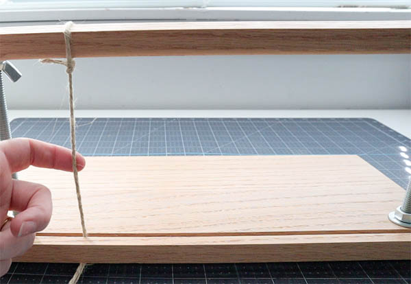 setting up a book binding making sewing frame steps