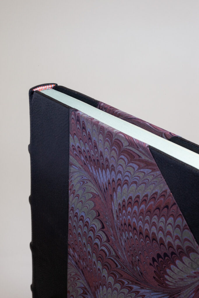 half leather bound binding book by justin who joined me in our class at the aab this past summer 2022