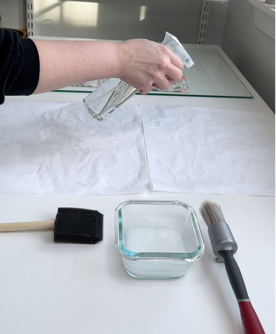 spray another layer of distilled water over the surface of the rice paper