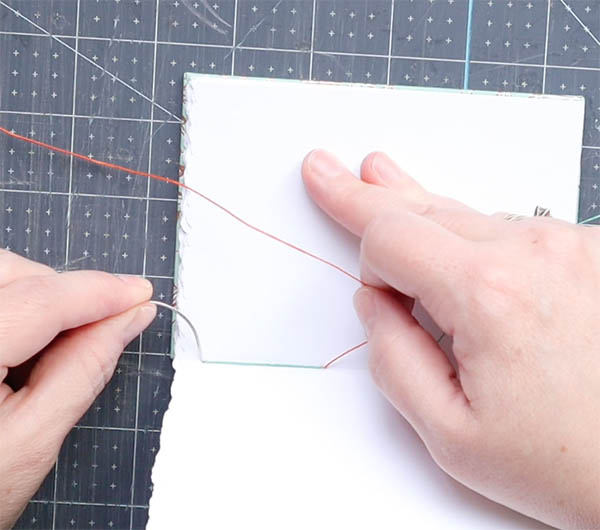 sewing the second signature of a four needle coptic binding journal tutorial