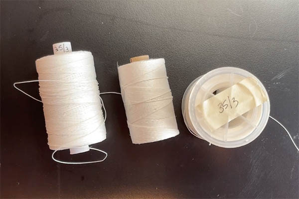 test different thread thicknesses to know which one will cause the least spine swell using this trick