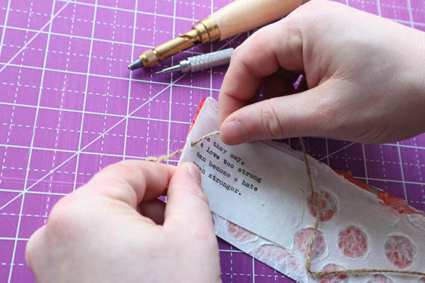 weave a string through the hole using jute twine cord or string